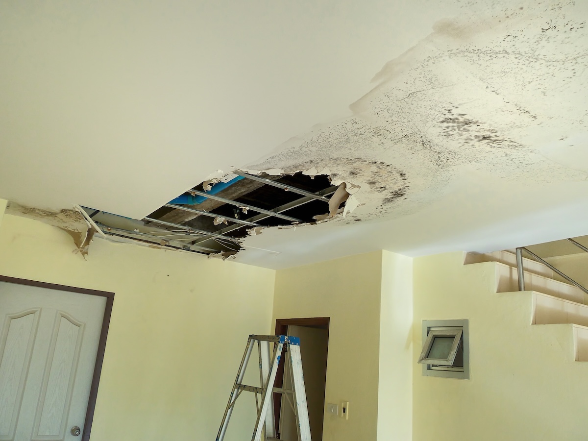 Water Leak. Water leaks down the rooftop floor.